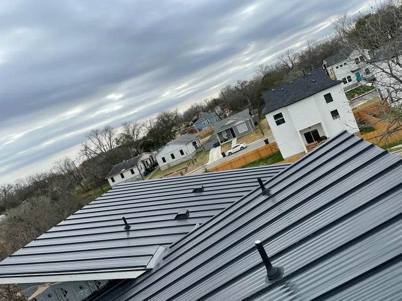 Standing seam metal roof panels with vents for Skylight Repair in Lacombe